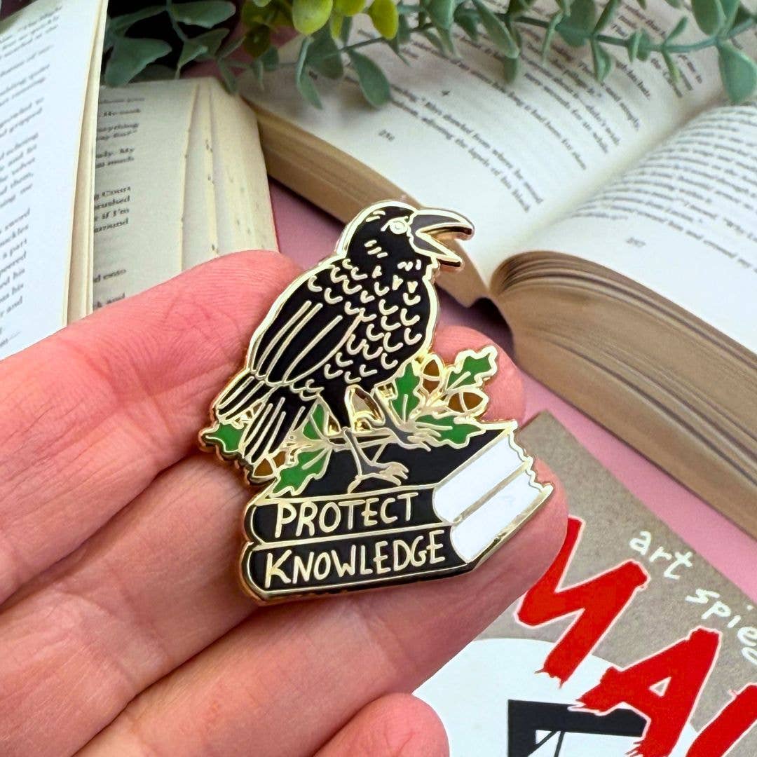 Protect Knowledge Lapel Pin