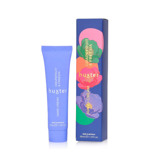 Huxter grapefruit and freesia hand cream with packaging on a white background