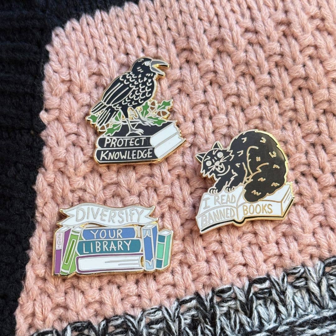 Protect Knowledge Lapel Pin