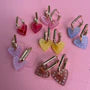 Frida Hearts // on rectangle gold coloured hoops - pink -
